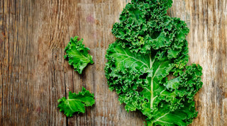 Kale leaves on a wooden table